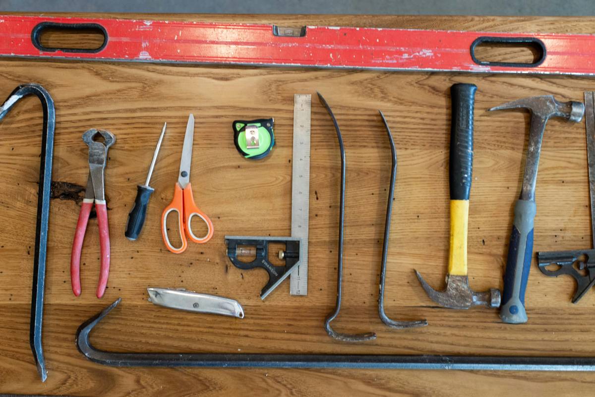 Close-up of a professional wire cutter hand tool cutting copper electrical wire cleanly